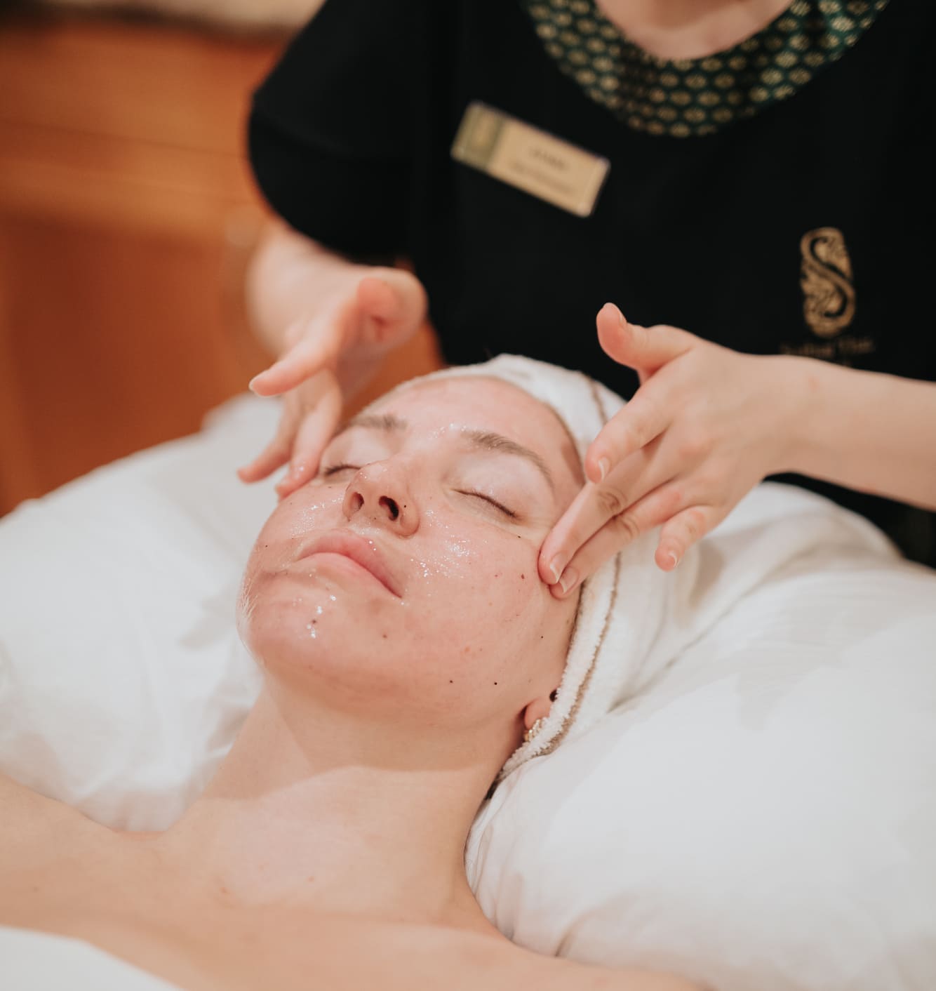 Young woman enjoying massage in Sabai spa