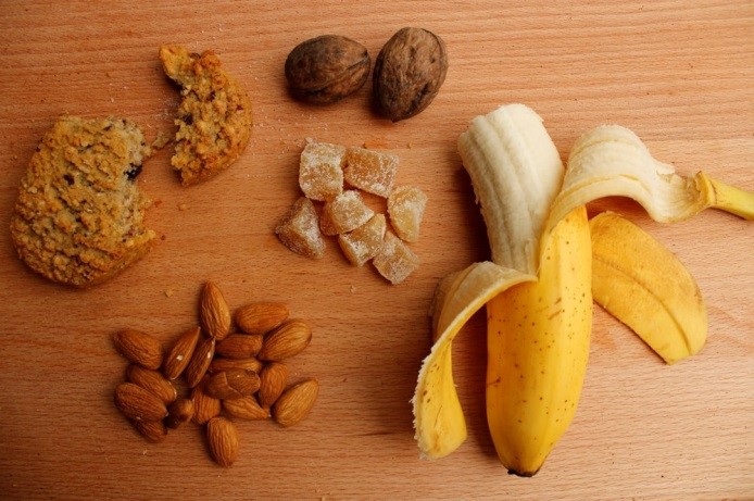 Variety of Carbohydrate foods in the wooden background