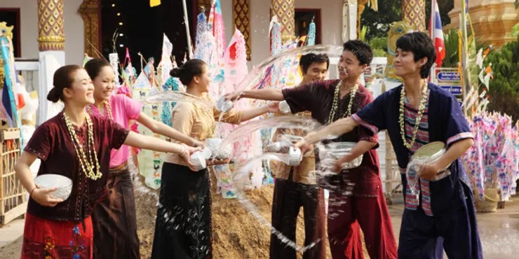Thailand people throwing Water on each other.