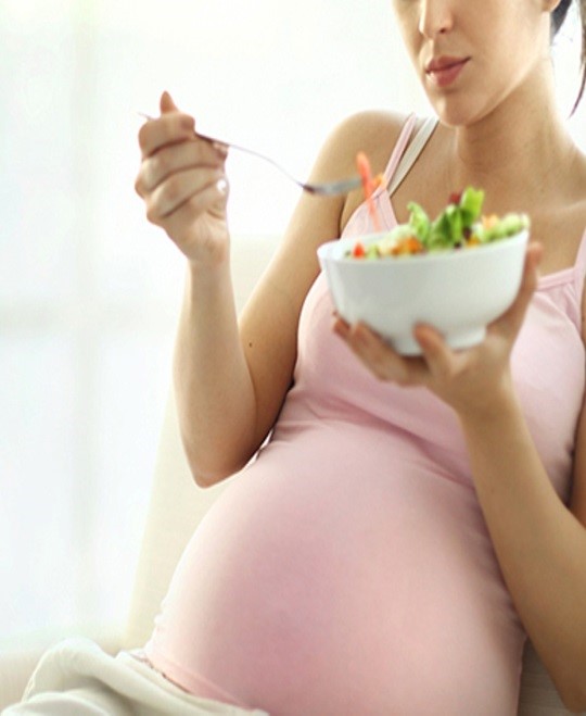 Pregnant Woman Eating