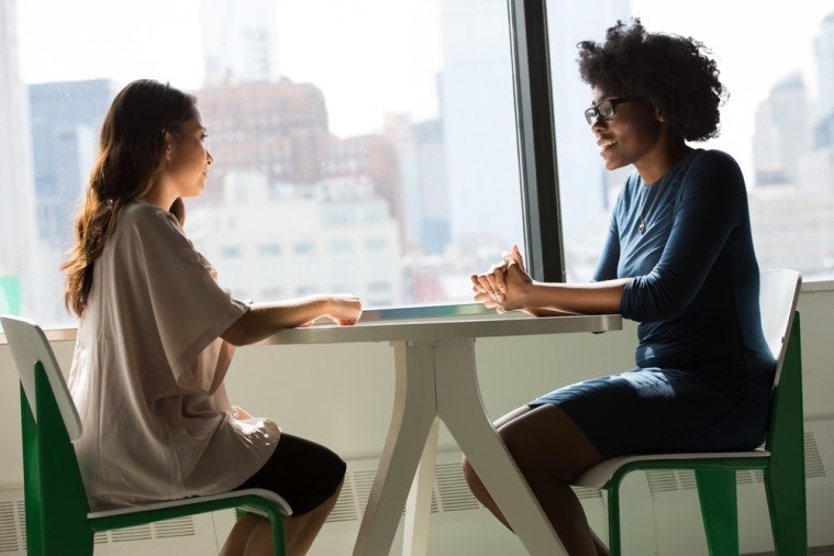Two women having conversation