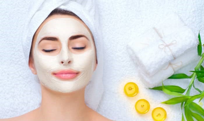 Beautiful woman Applying Moisturizers in face